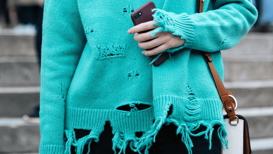 11 Distressed Sweaters Guaranteed to Give Your Fall Wardrobe a Cool Edge